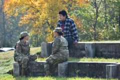 Minnesota National Guard Sgt. First Class Jessica Stiffarm (left) and Staff Sgt. Jennifer Stiffarm (right) share stories with a Mille Lacs Band of Ojibwe student from Onamia High School Sept. 20, 2019 during a ‘Planting for the Future’ cultural and informational exchange event on Camp Ripley.