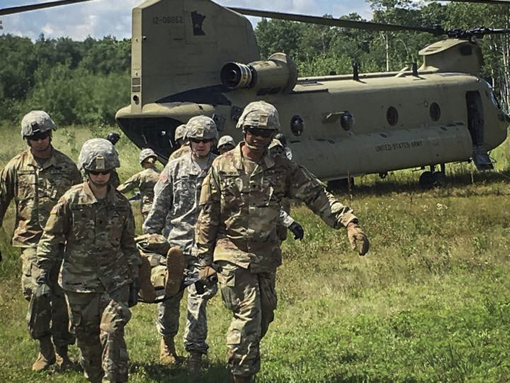 Soldiers of the 204th Medical Company Area Support train on patient evacuation during annual training at Camp Ripley on July 23, 2018.