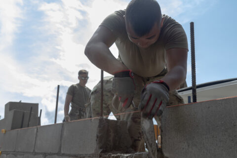 A Soldier of the 851st EVCC, 682nd Engineer Battalion, conducts construction operations